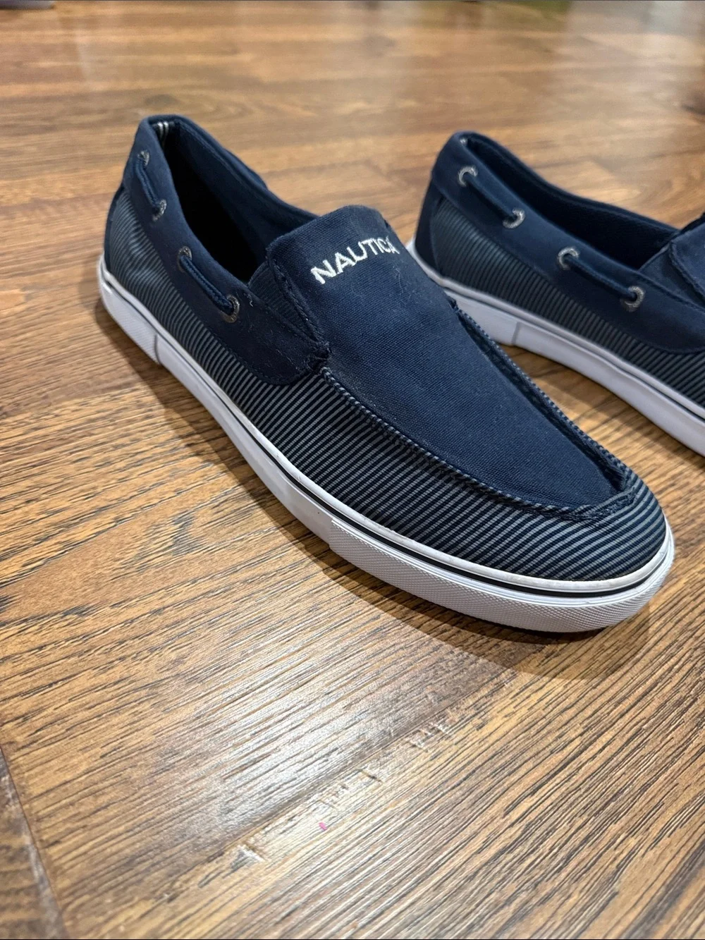 Nautica Men’s Navy Slip-On Canvas Boat Sneakers with White Sole